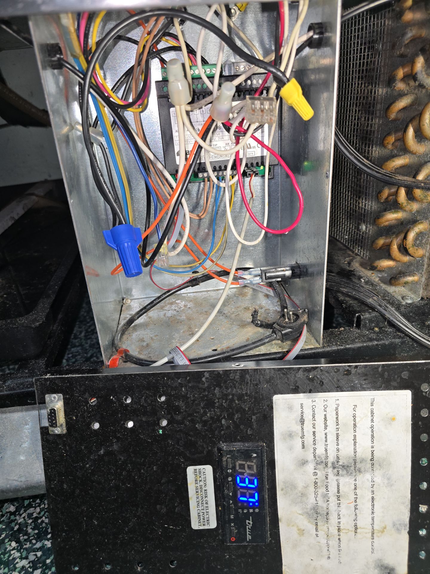 True commercial refrigerator digital controller and wiring panel during repair