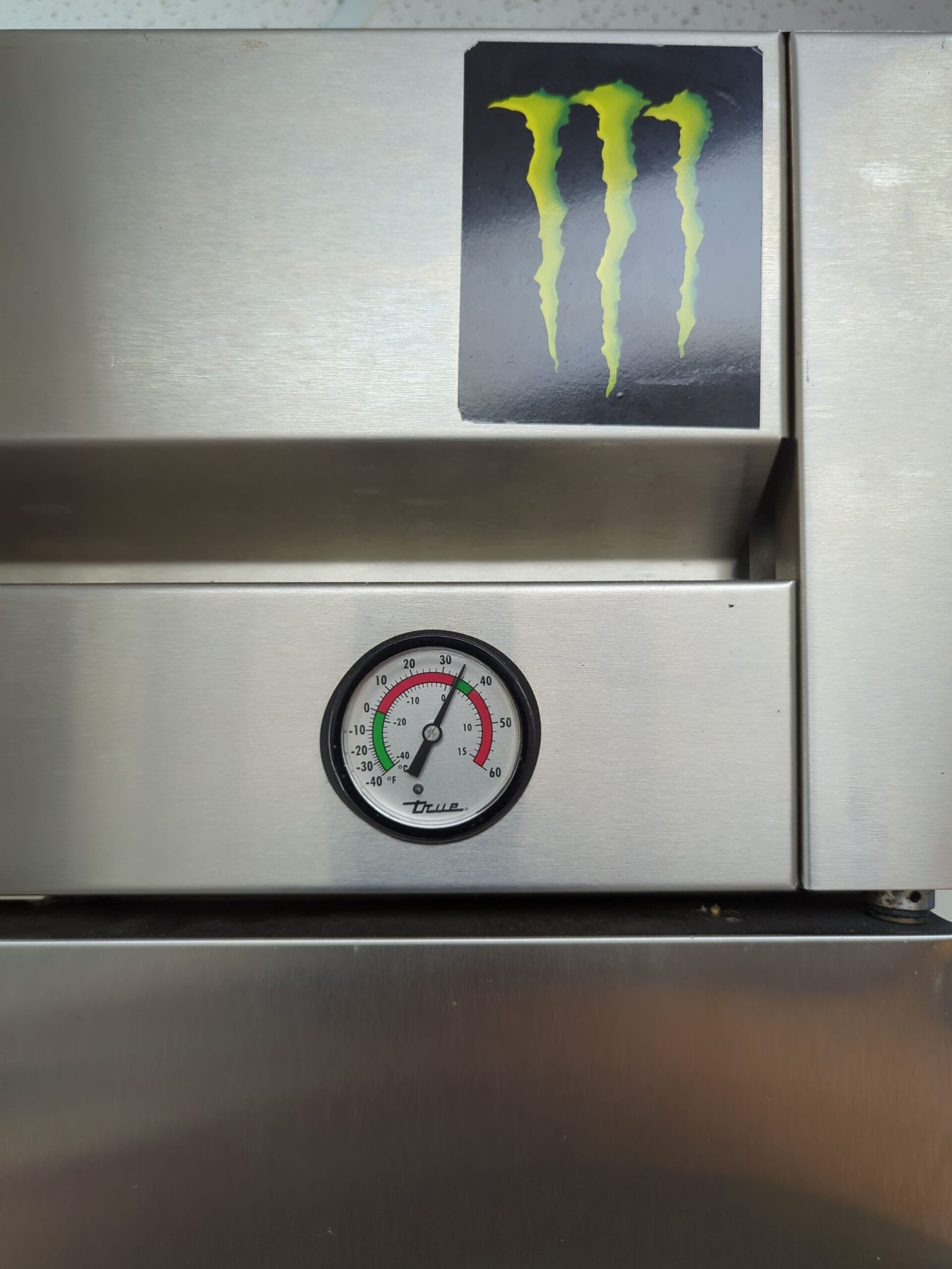 True commercial refrigerator temperature gauge showing temperature reading
